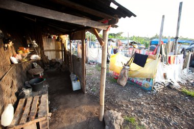 BALI, INDONESIA  APRIL 11: Scavenging at the dump near the Gianyar town on April 11, 2012 on Bali, Indonesia. Bali daily produced 10,000 cubic meters of waste